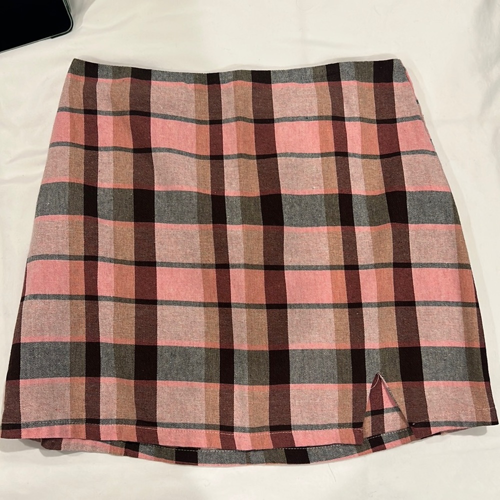Pink and black plaid skirt.